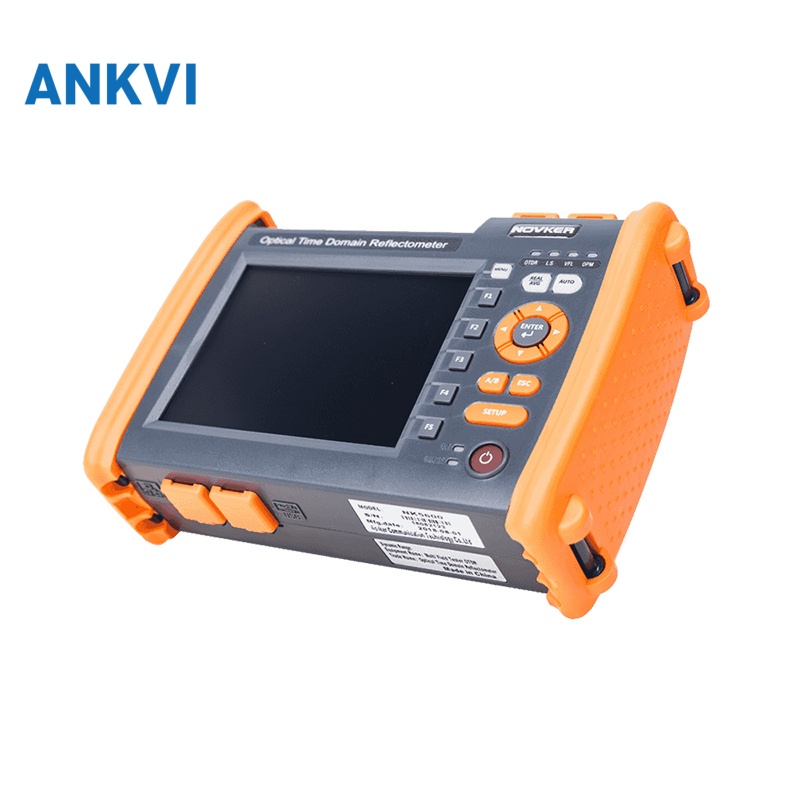 NK5600 OTDR front view, orange handheld with the color touch screen off and keypad visible