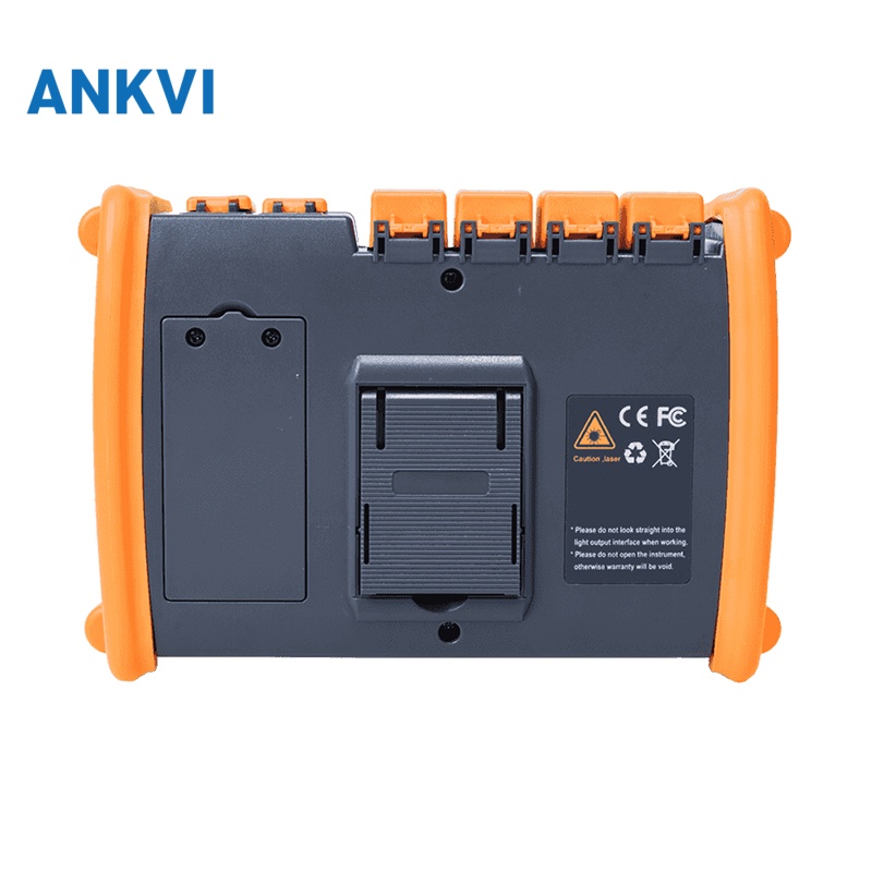 NK5600 OTDR rear view with the battery compartment open and a laser warning label