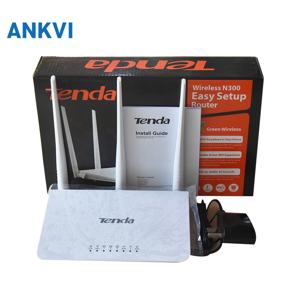 Tenda F3 retail box with power adapter, Ethernet cable and setup guide laid out